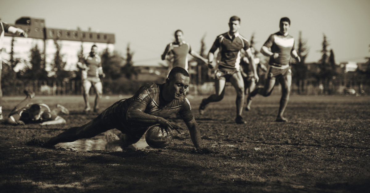 The image shows rugby playing men