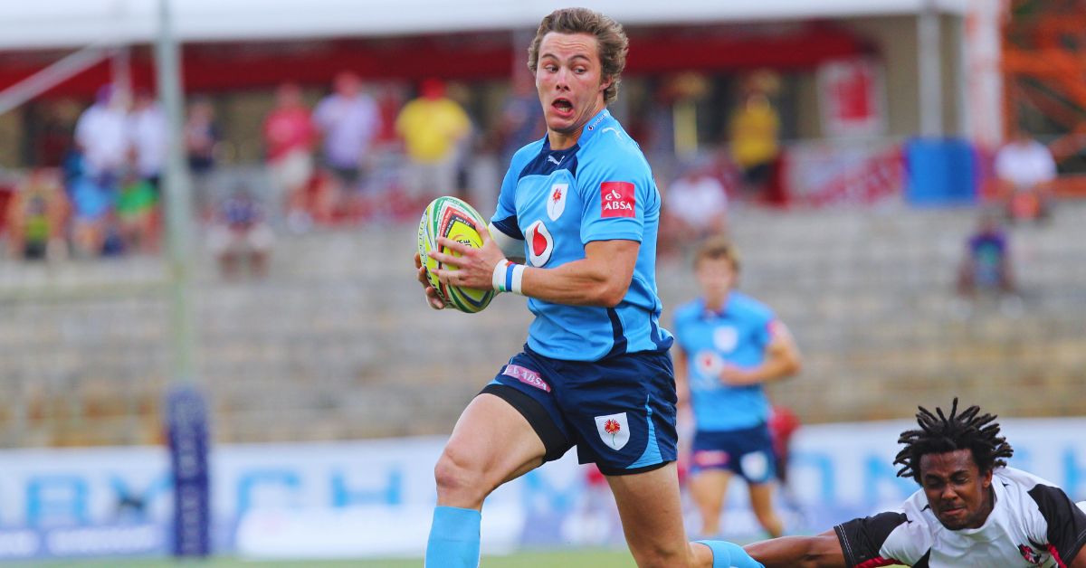 An action shot of rugby players in a high-paced match showcasing power and speed.