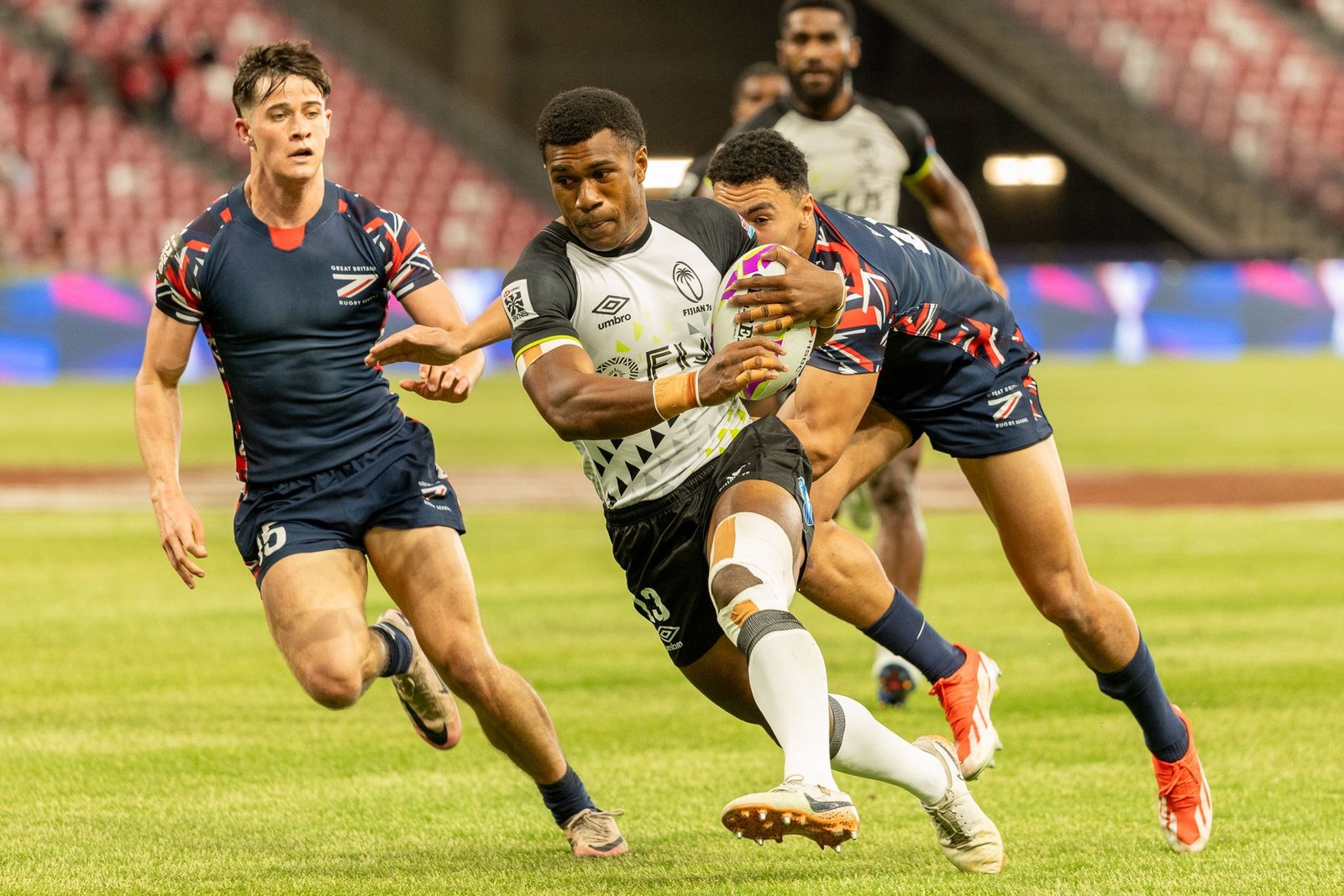 Here you go, plain text (non-HTML): **Meta description (160 characters):** Fiji, New Zealand, France and South Africa reach the HSBC SVNS Singapore semi-finals after thrilling pool action at the National Stadium.
